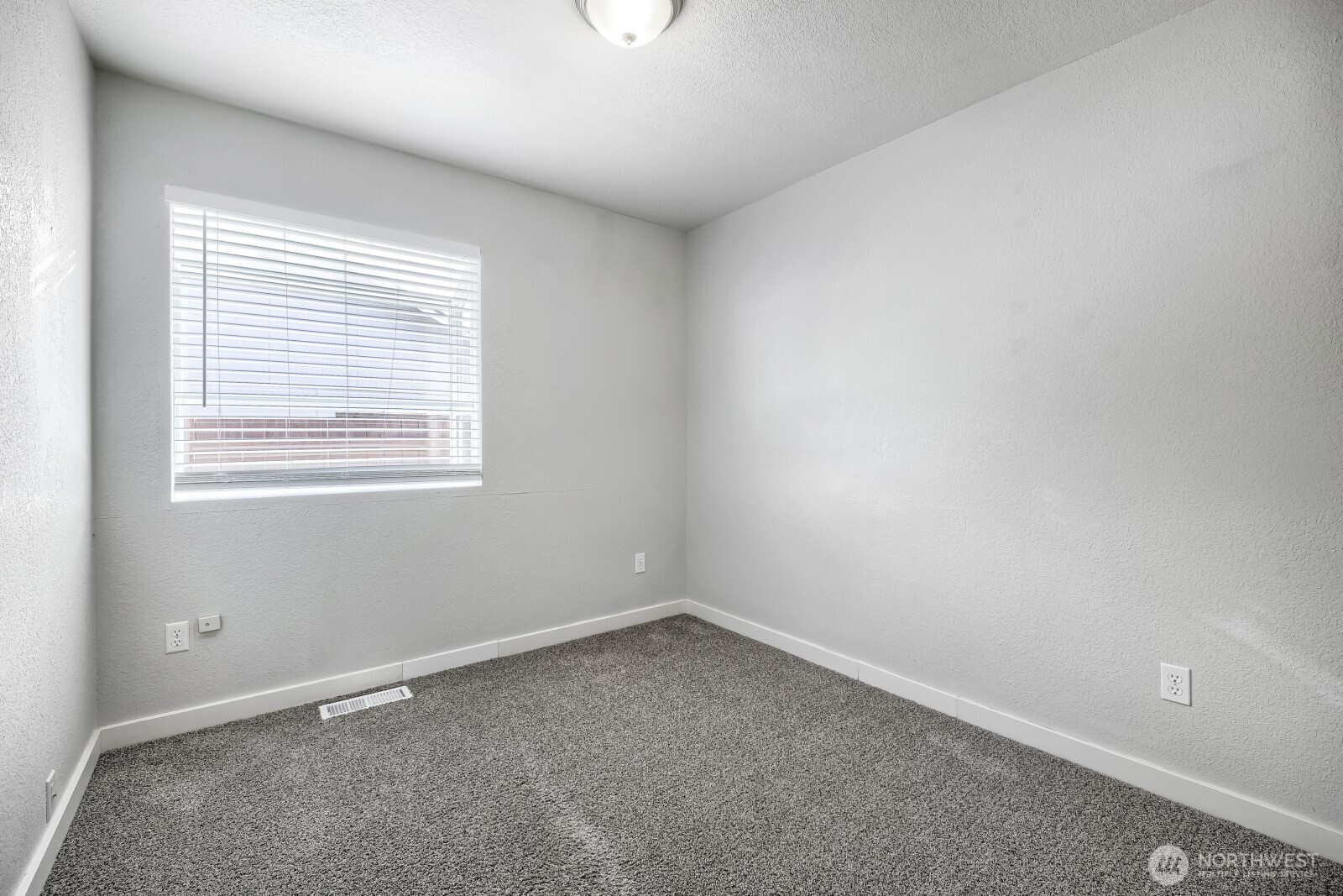 1607 Springfield Court Northeast Olympia, WA 98506 - Photo 12 of 21 an empty room with a window