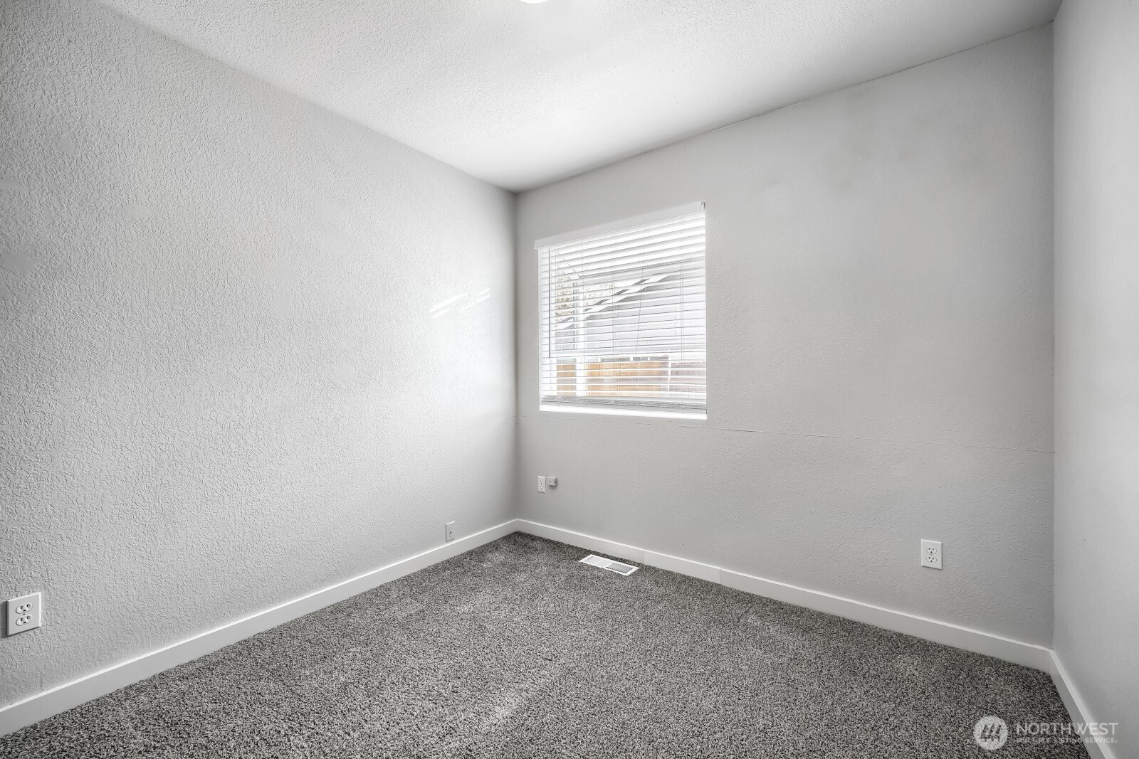 1607 Springfield Court Northeast Olympia, WA 98506 - Photo 15 of 21 an empty room with a window