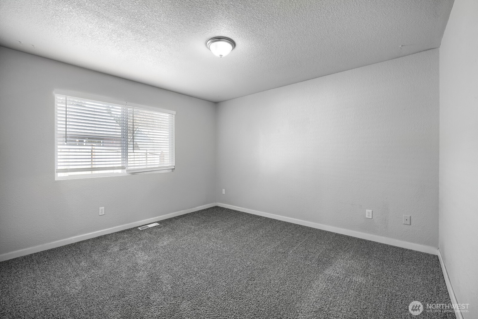 1607 Springfield Court Northeast Olympia, WA 98506 - Photo 9 of 21 an empty room with a window