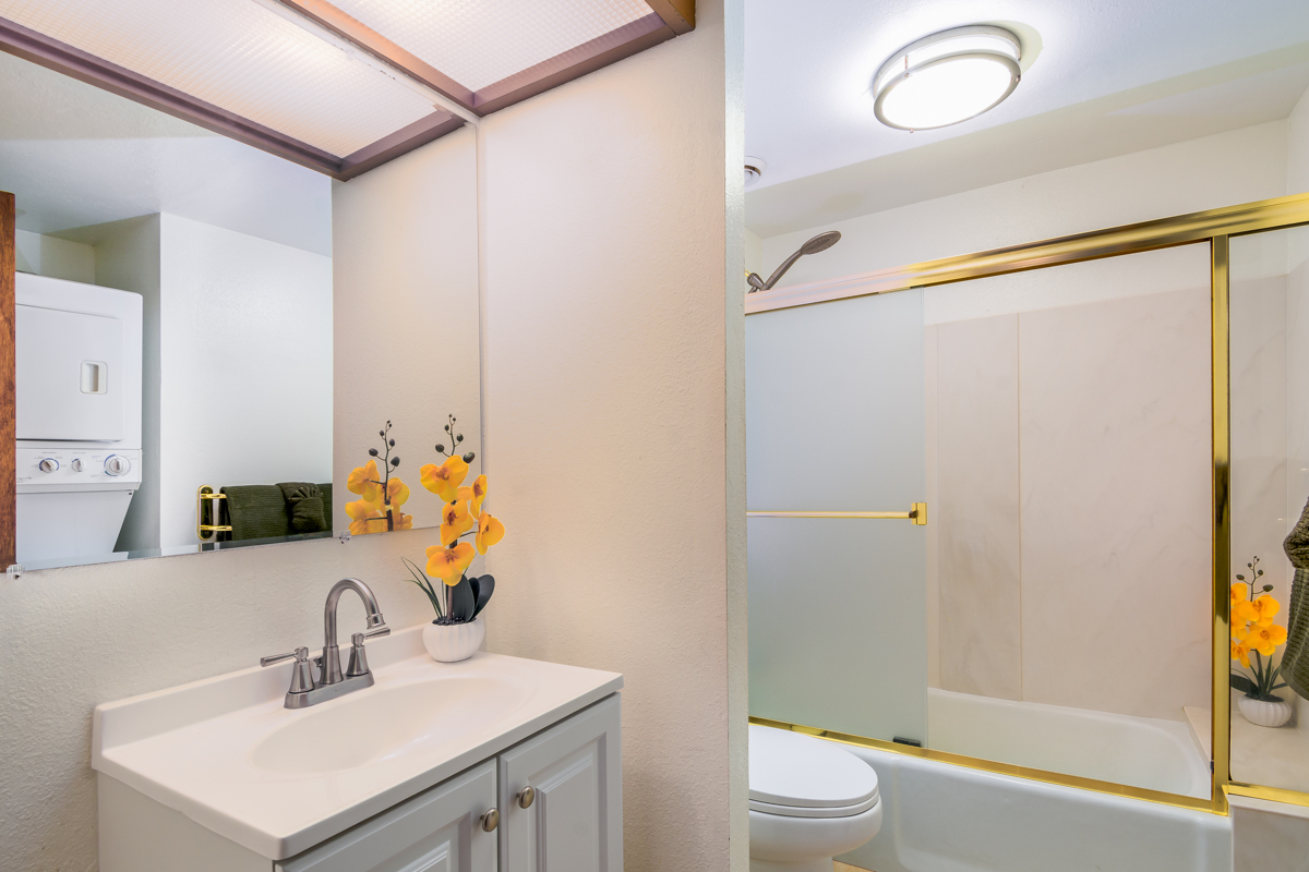 68-3840 Lua Kula Street, Unit D201 Waikoloa, HI 96738 - Photo 19 of 30 a bathroom with a sink a toilet and shower