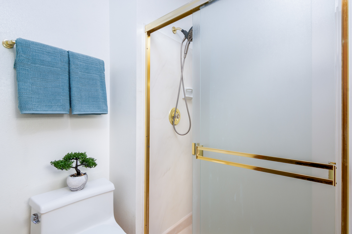 68-3840 Lua Kula Street, Unit D201 Waikoloa, HI 96738 - Photo 23 of 30 a utility room with a shower and a ceiling fan