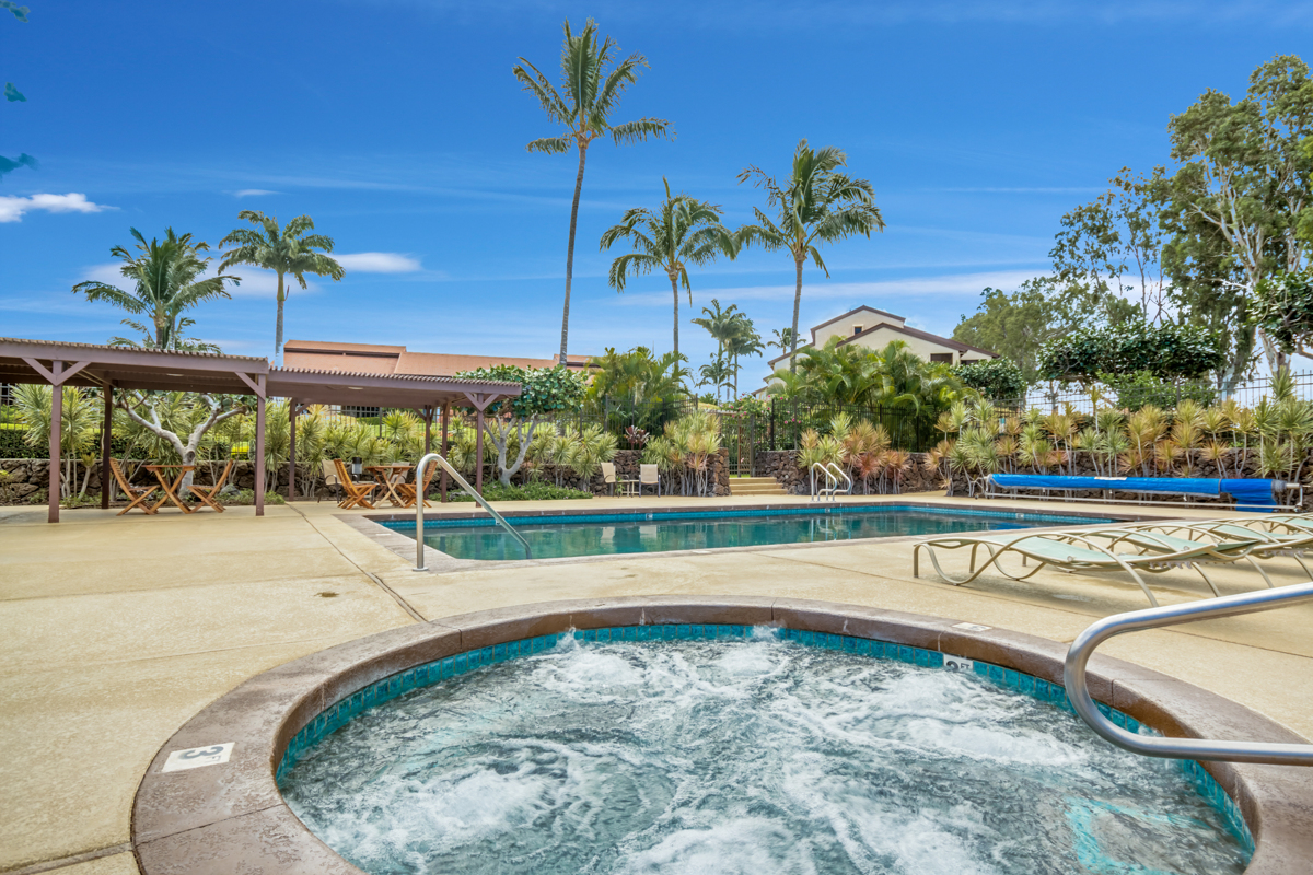 68-3840 Lua Kula Street, Unit D201 Waikoloa, HI 96738 - Photo 26 of 30 a view of a swimming pool with a yard