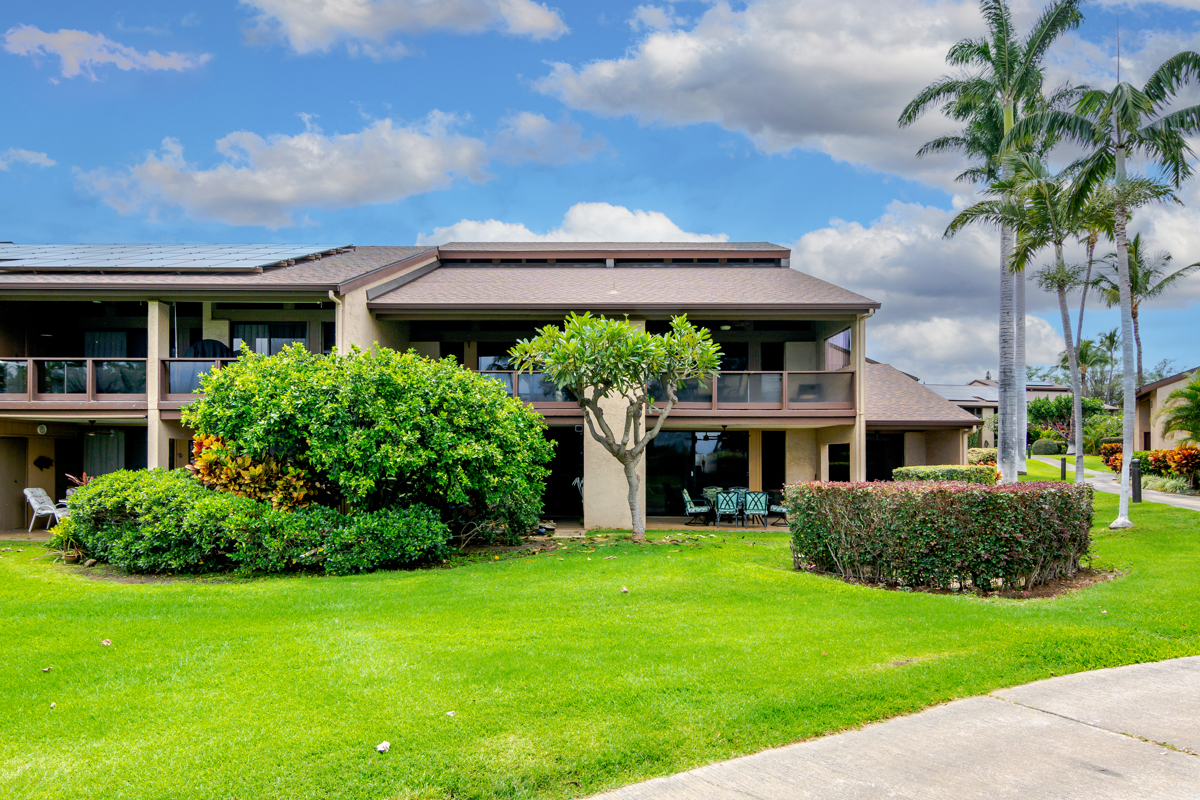 68-3840 Lua Kula Street, Unit D201 Waikoloa, HI 96738 - Photo 27 of 30 a front view of a house with a yard