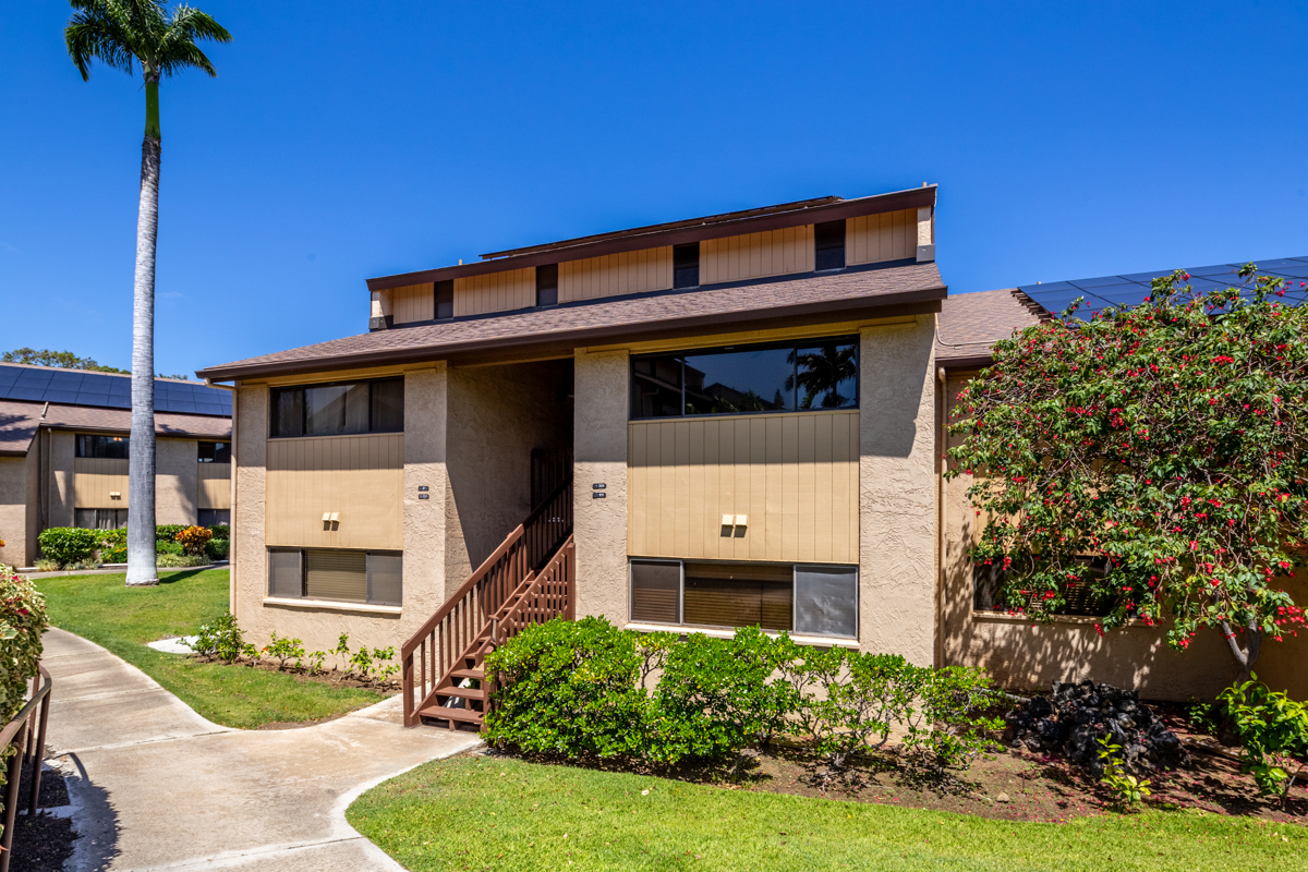 68-3840 Lua Kula Street, Unit D201 Waikoloa, HI 96738 - Photo 28 of 30 a front view of a house with a yard