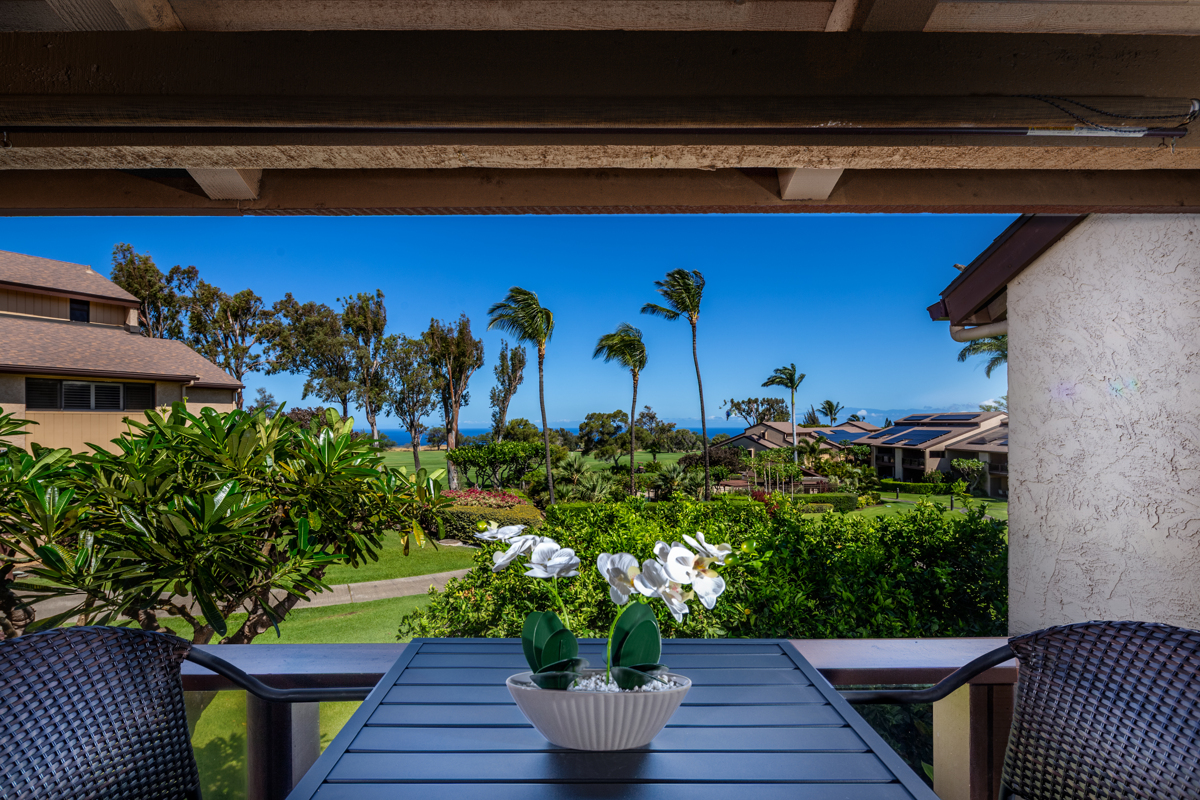 68-3840 Lua Kula Street, Unit D201 Waikoloa, HI 96738 - Photo 10 of 30 a view of a balcony with potted plants
