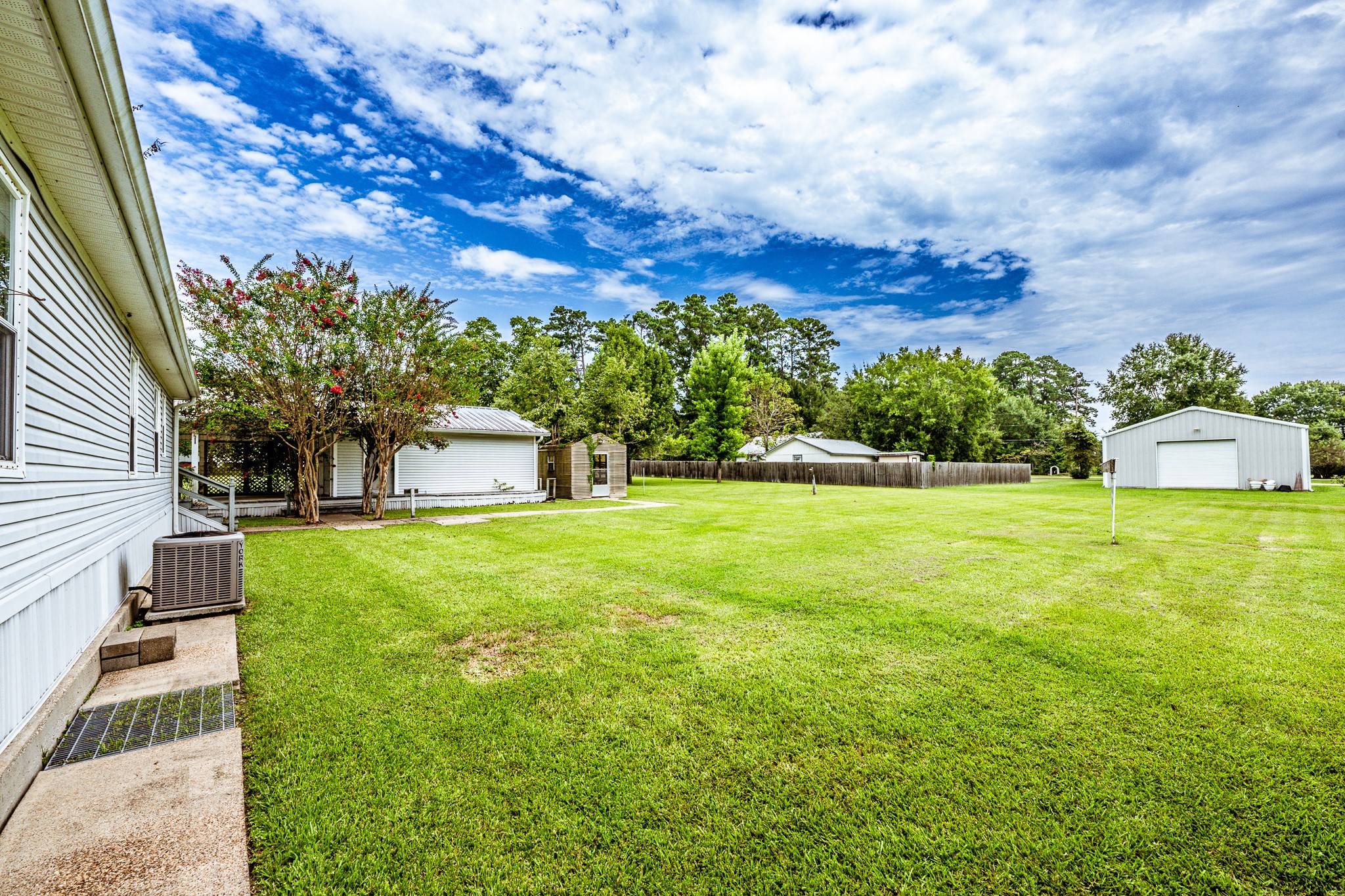 227 Cutter Drive Trinity, TX 75862 - Photo 27 of 39 a front view of a house with a yard