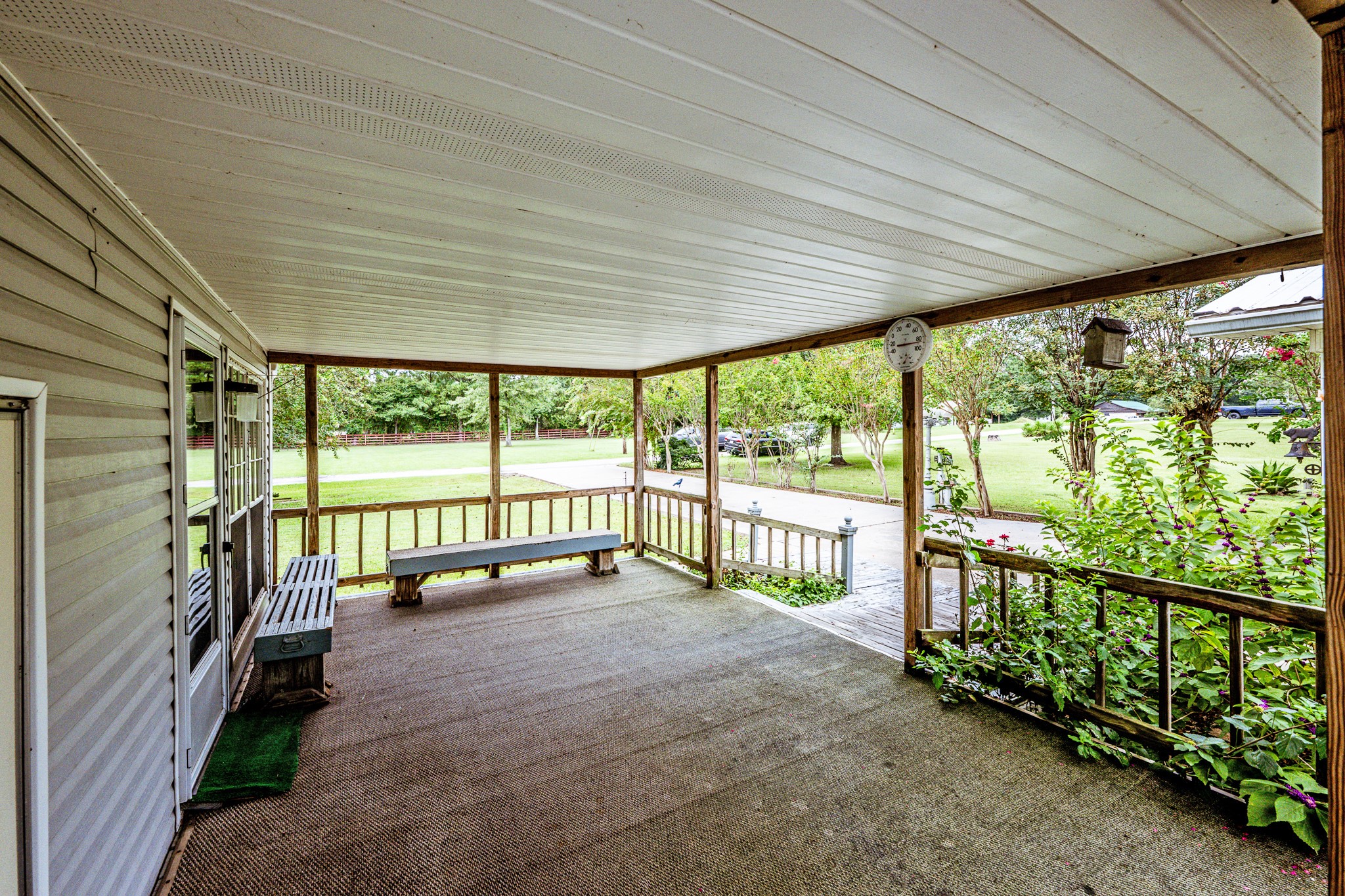 227 Cutter Drive Trinity, TX 75862 - Photo 28 of 39 a view of a porch with wooden floor and outdoor space