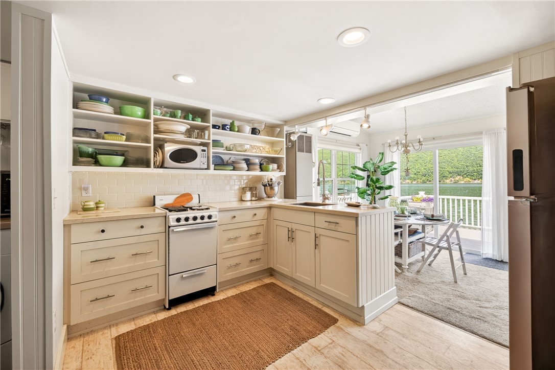 7113 State Rte 21 South Bristol, NY 14512 - Photo 15 of 47 Open Concept kitchen overlooks gathering room, dec