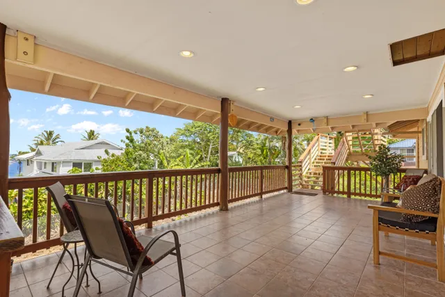 a view of a porch with furniture