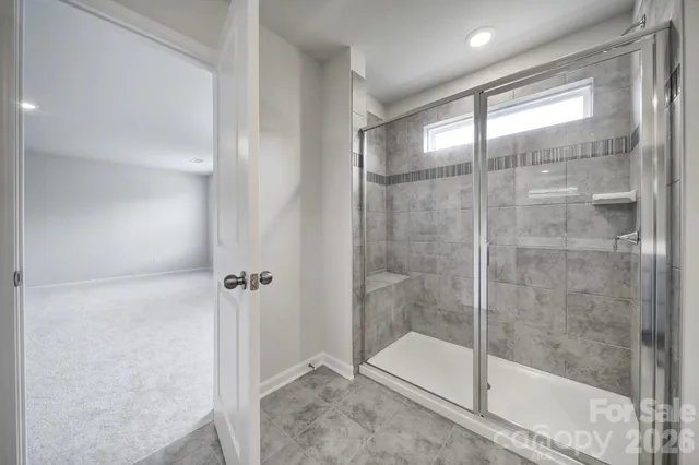 a bathroom with a double vanity sink and mirror