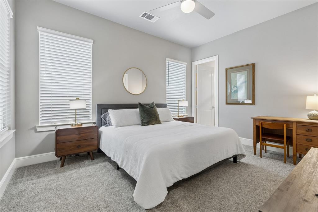6700 Herbert Road Colleyville, TX 76034 - Photo 17 of 32 a bedroom with a bed and a table