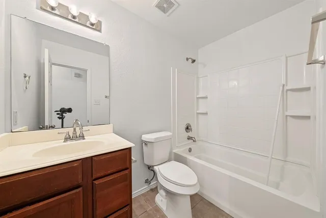 an empty room with a workbench