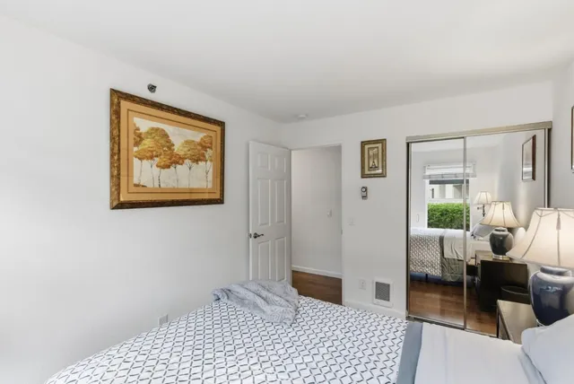 a bedroom with furniture and a window