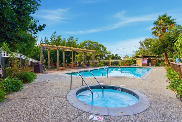 a view of a house with a swimming pool