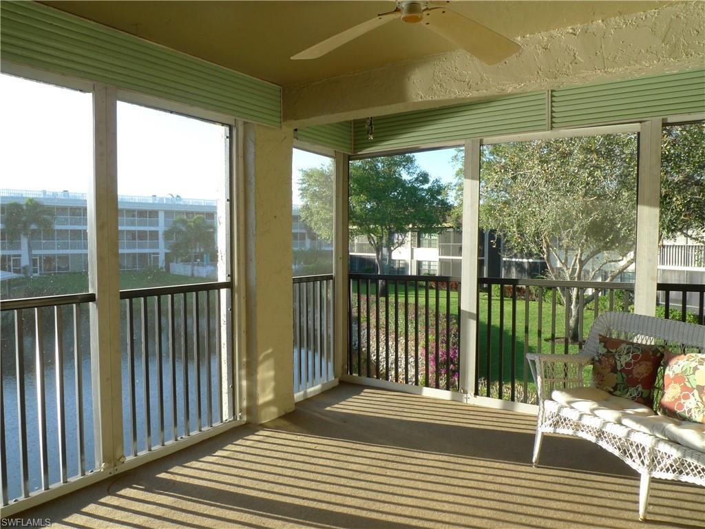 3115 Riviera Drive Naples, FL 34103 - Photo 2 of 15 LAKE VIEW IS WEST