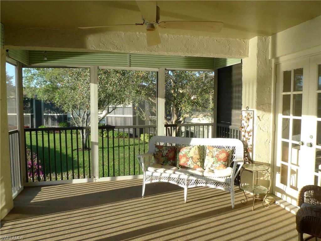 3115 Riviera Drive Naples, FL 34103 - Photo 3 of 15 North side lanai view from living room with french door entry to master ensuite