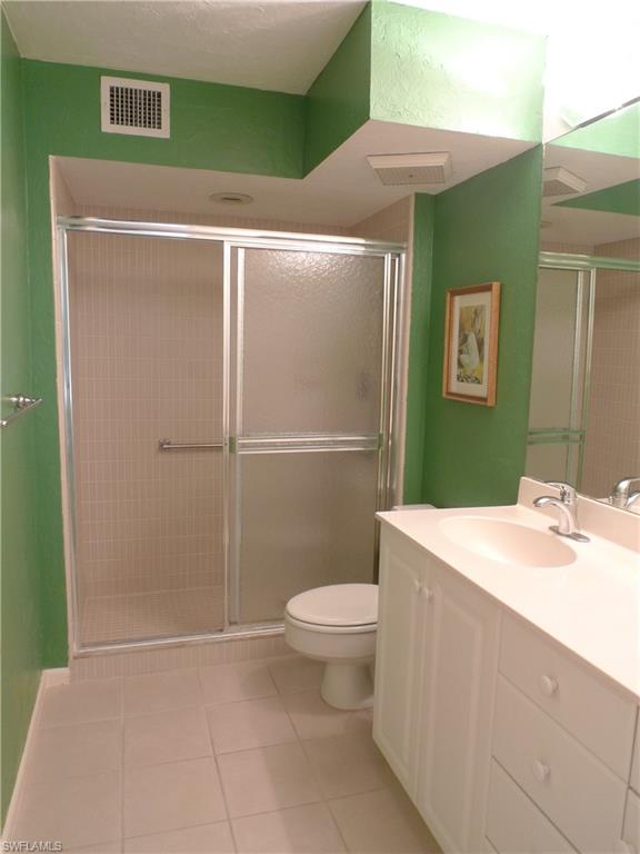 3115 Riviera Drive Naples, FL 34103 - Photo 9 of 15 MASTER BATH