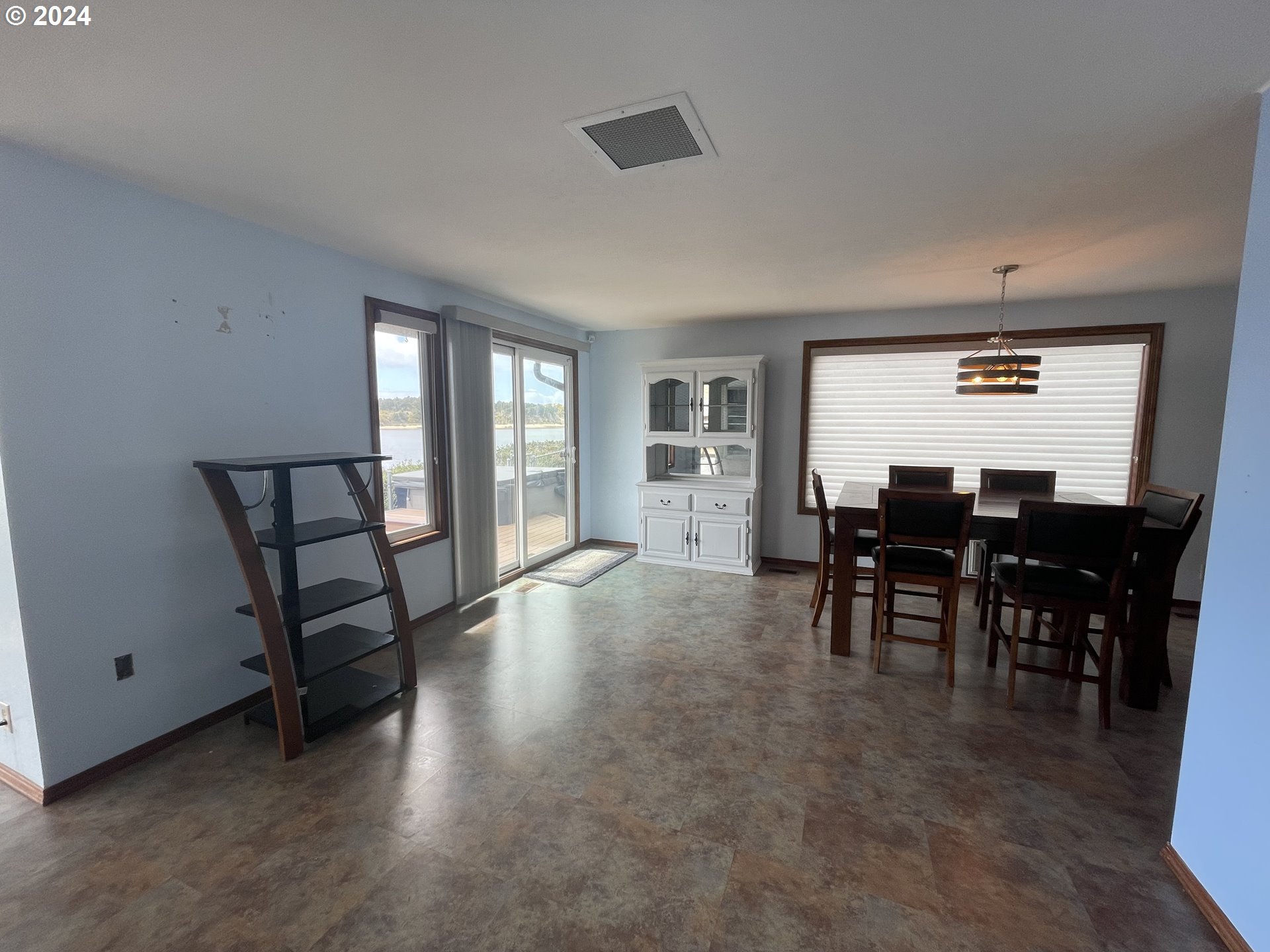 100 Rhododendron Drive Florence, OR 97439 - Photo 11 of 47 a view of a livingroom with furniture and window