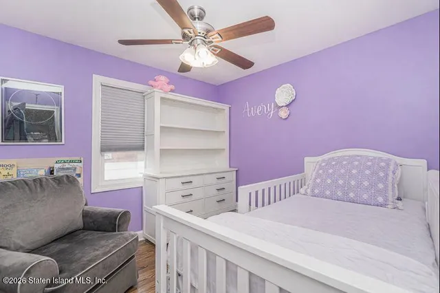 a bedroom with a bed and furniture