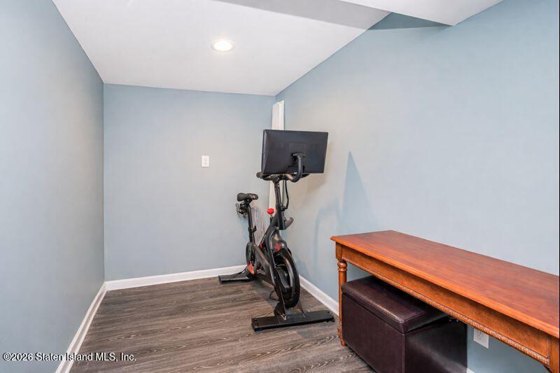 11 North Rhett Avenue Staten Island, NY 10308 - Photo 13 of 20 a room with gym equipment and wooden floor
