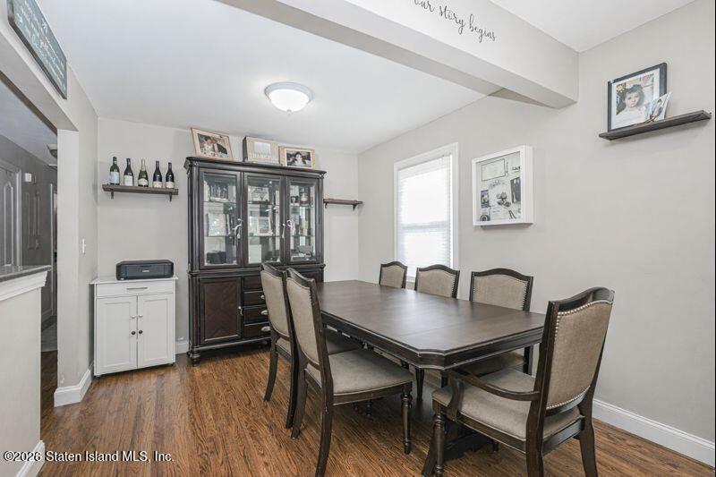 11 North Rhett Avenue Staten Island, NY 10308 - Photo 6 of 20 a view of a dining room with furniture and wooden floor