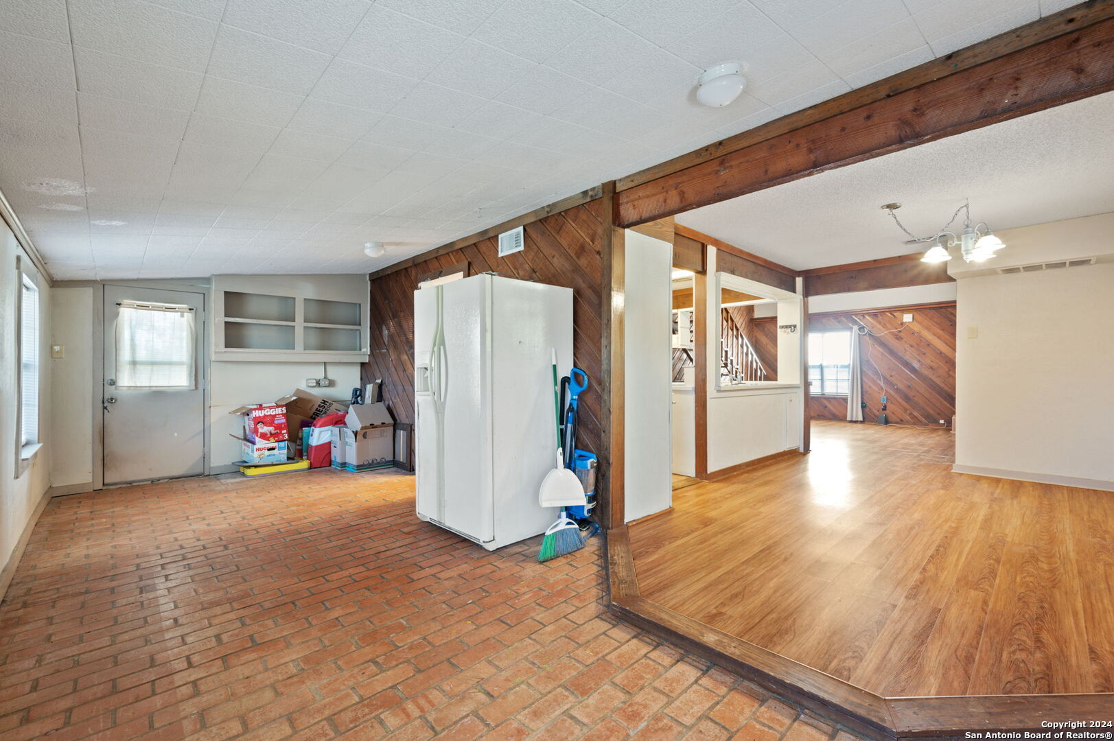 795 Highway 16 Jourdanton, TX 78026 - Photo 12 of 25 a view of a hallway with a garage