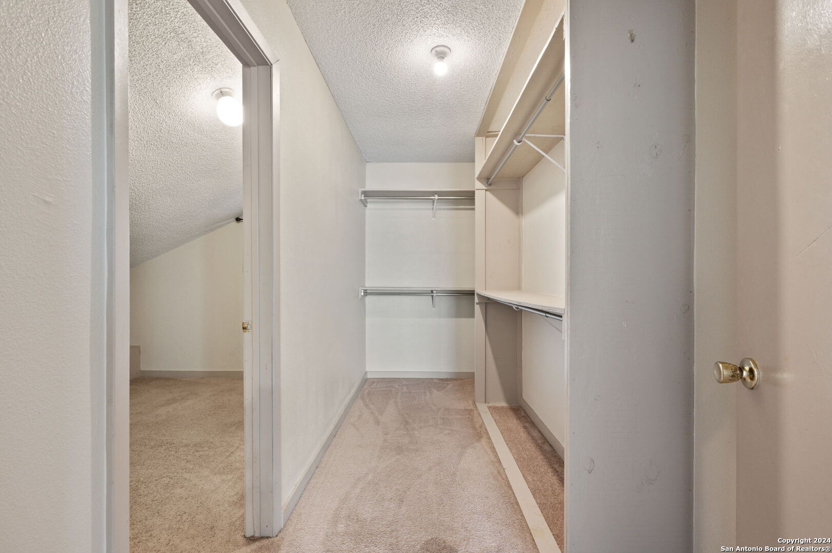 795 Highway 16 Jourdanton, TX 78026 - Photo 22 of 25 a view of an empty walk in closet