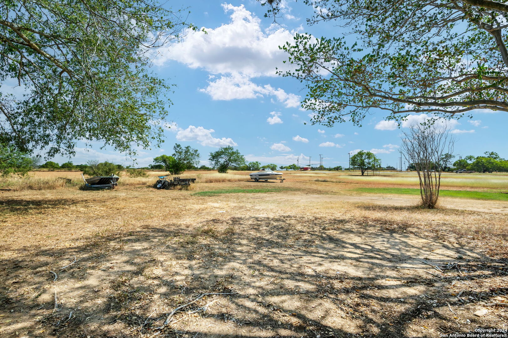 795 Highway 16 Jourdanton, TX 78026 - Photo 25 of 25 a view of a lake with houses