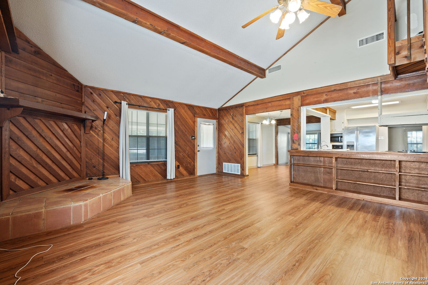 795 Highway 16 Jourdanton, TX 78026 - Photo 6 of 25 a view of an outdoor space with wooden floor and windows