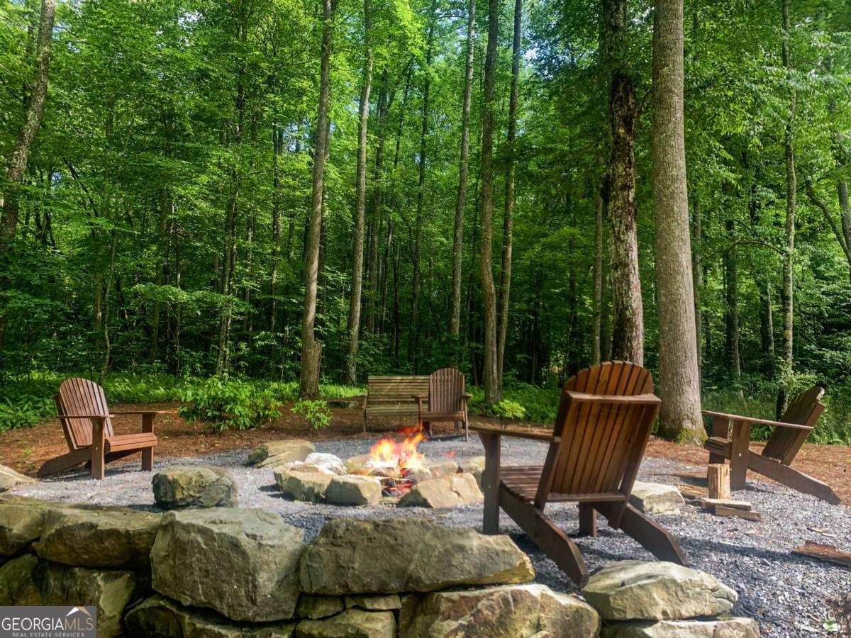 Lot 141 Twisted Oak Road Talking Rock, GA 30175 - Photo 18 of 20 a view of a patio with furniture