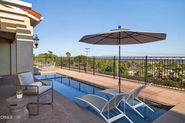 a stove top oven sitting inside of a kitchen