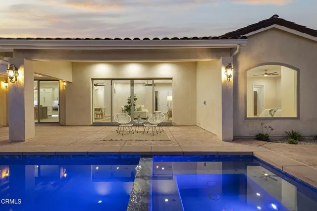 a room with furniture and a gate