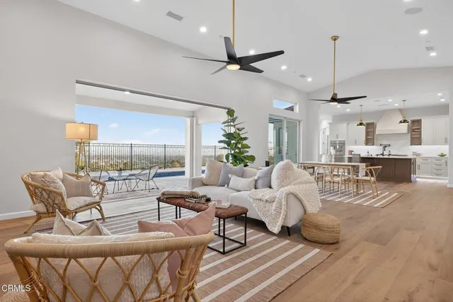 a view of swimming pool with seating area