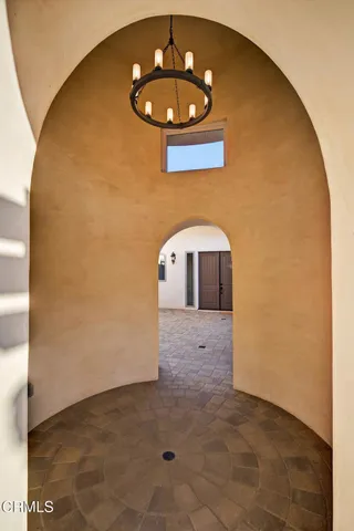 a view of swimming pool with outdoor seating