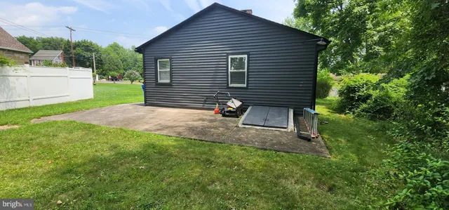 a backyard of a house with seating space