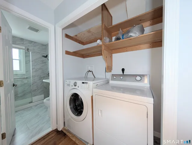 a utility room with dryer and washer
