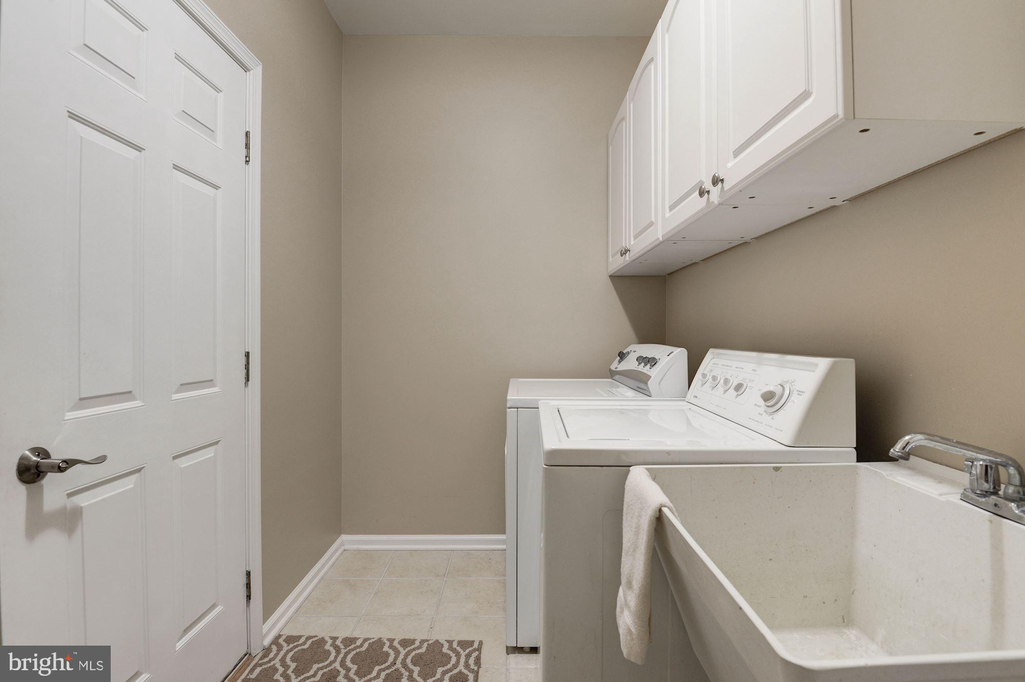 1326 Murray Downs Way Reston, VA 20194 - Photo 23 of 41 a utility room with dryer and washer