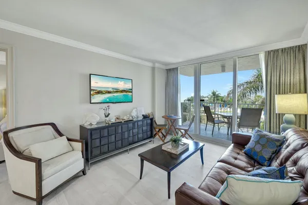 a living room with furniture and a gate