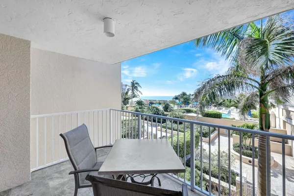 a view of a balcony with lake view