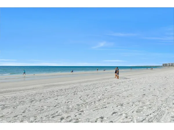 a view of a beach with an ocean view