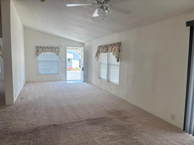 500 North Tully Road Turlock, CA 95380 - Photo 4 of 13 a view of a big room with windows and chandelier fan