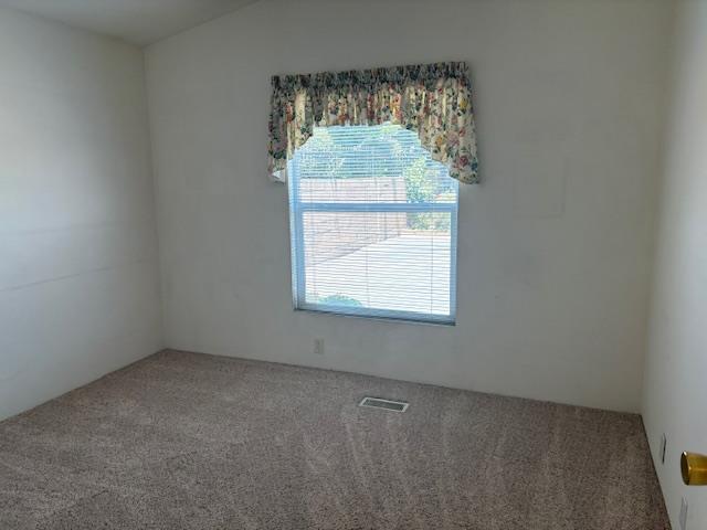 500 North Tully Road Turlock, CA 95380 - Photo 8 of 13 an empty room with a window