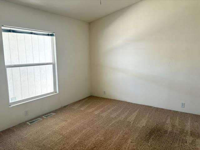 500 North Tully Road Turlock, CA 95380 - Photo 9 of 13 an empty room with a window