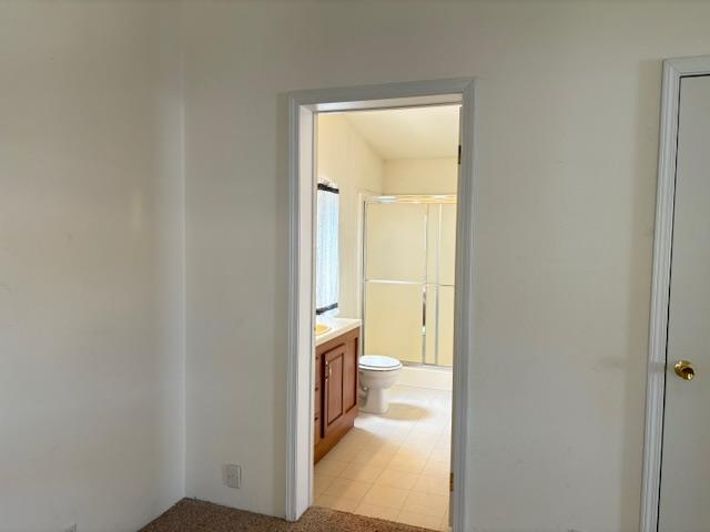 500 North Tully Road Turlock, CA 95380 - Photo 10 of 13 a view of a bathroom from a hallway