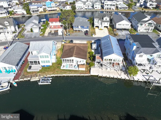 a view of multiple houses with outdoor space