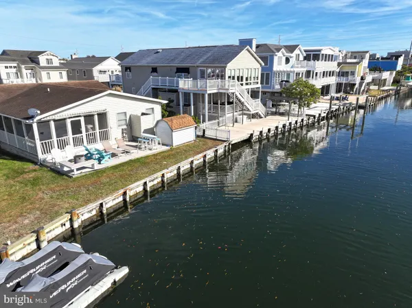 a view of a lake with tall buildings
