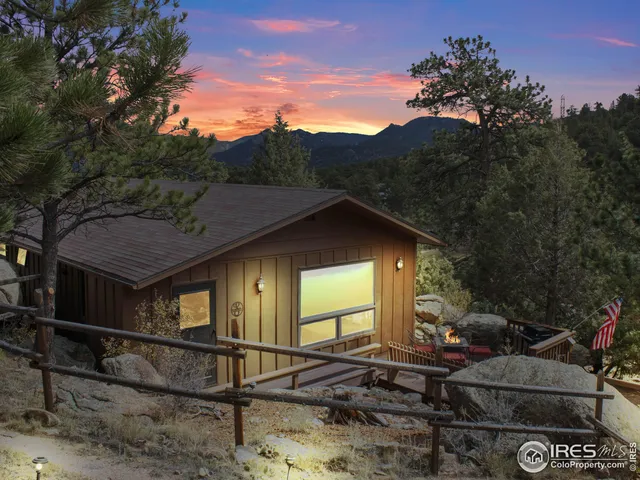 a view of house with backyard space and garden