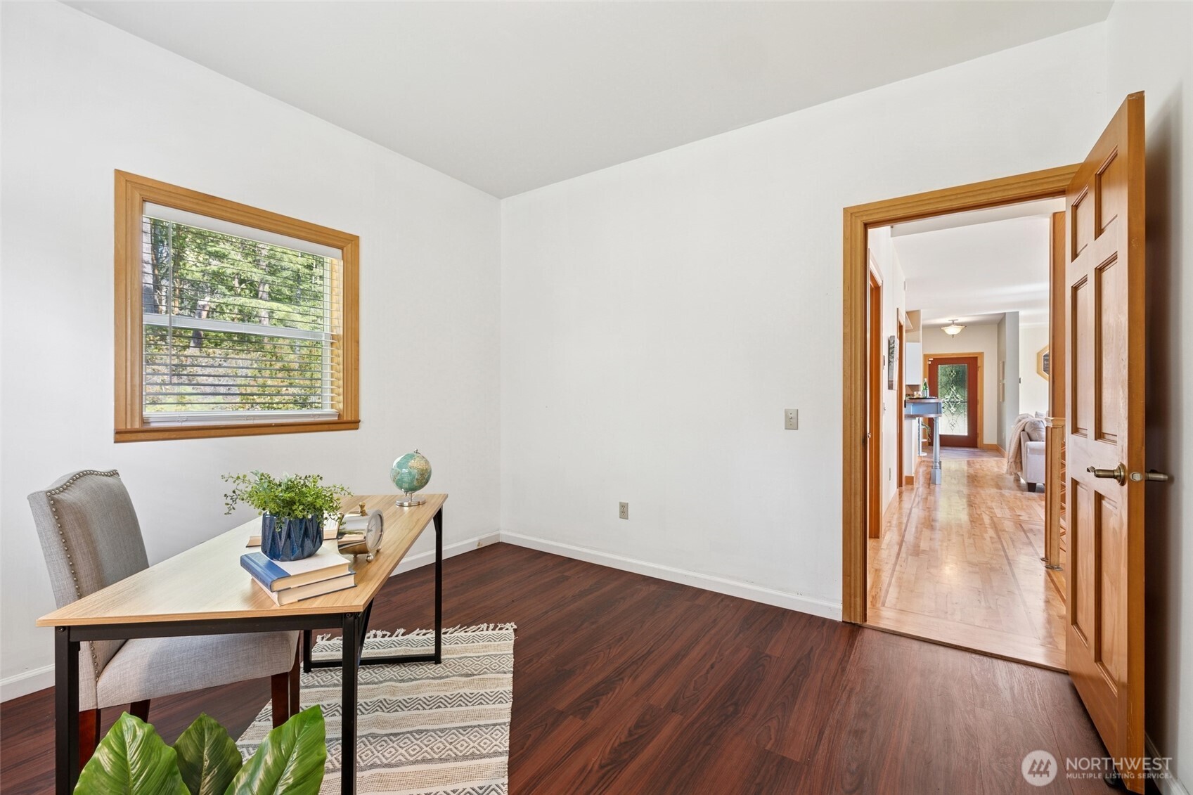 4987 Mutiny Bay Road Freeland, WA 98249 - Photo 13 of 40 a view of a livingroom with furniture and wooden floor