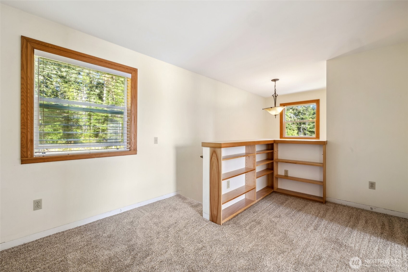 4987 Mutiny Bay Road Freeland, WA 98249 - Photo 16 of 40 a view of an empty room with a window