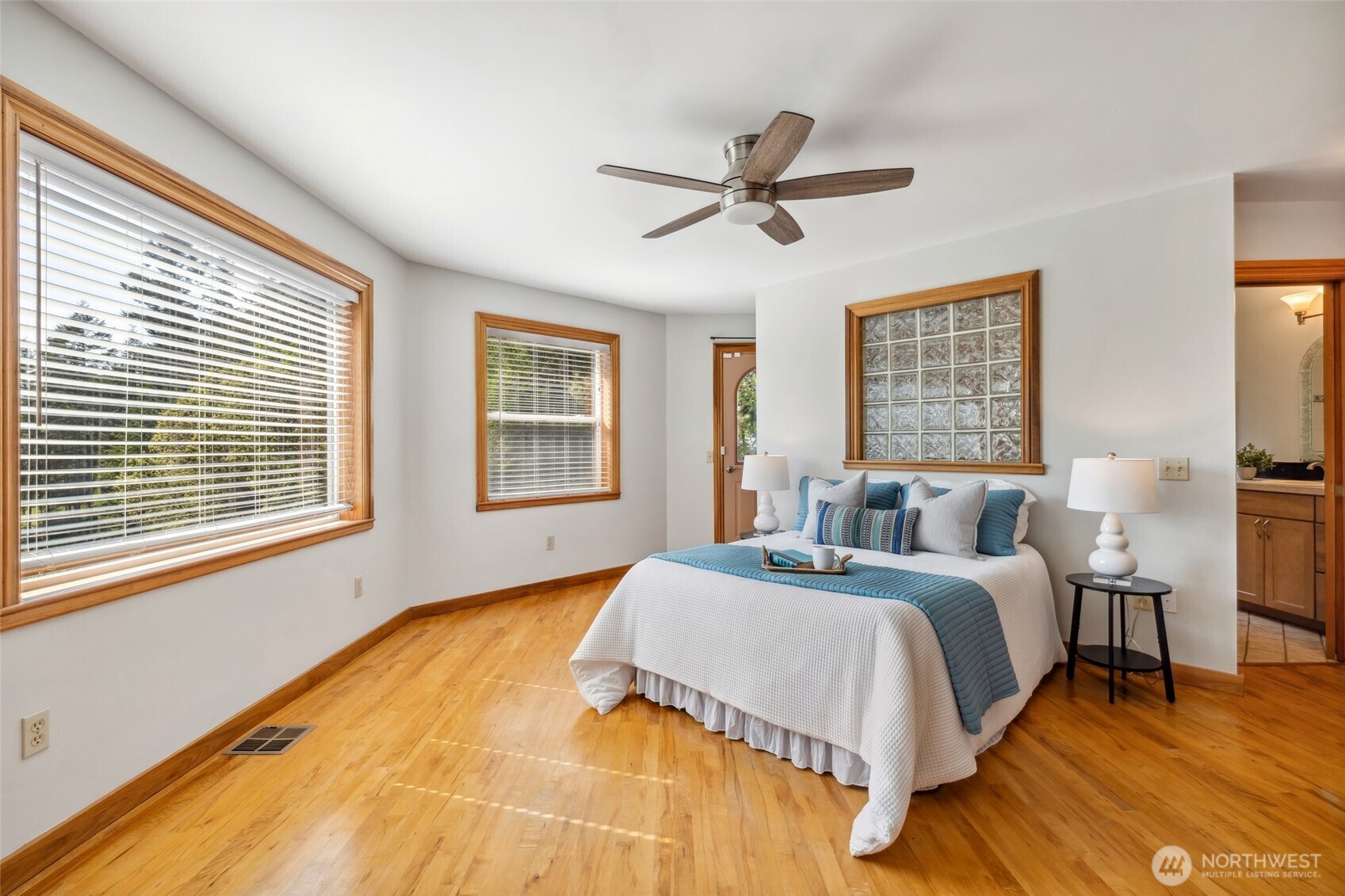 4987 Mutiny Bay Road Freeland, WA 98249 - Photo 17 of 40 a bedroom with a bed and a window